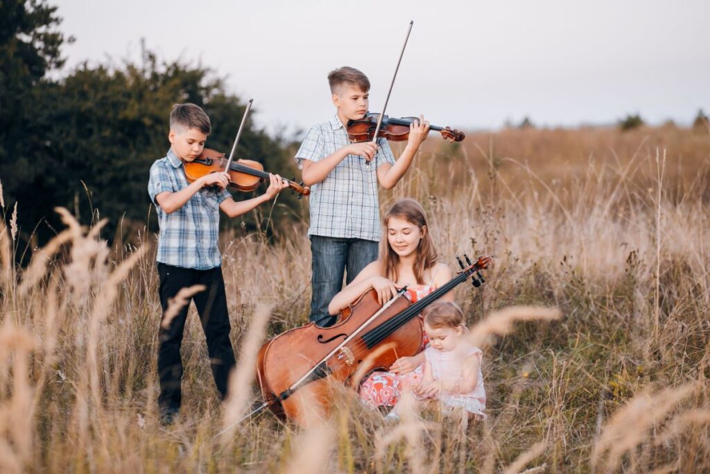 Why Learning an Instrument Can Be Life-Changing for Your Child - Sister together beautiful kid outdoor - freepik